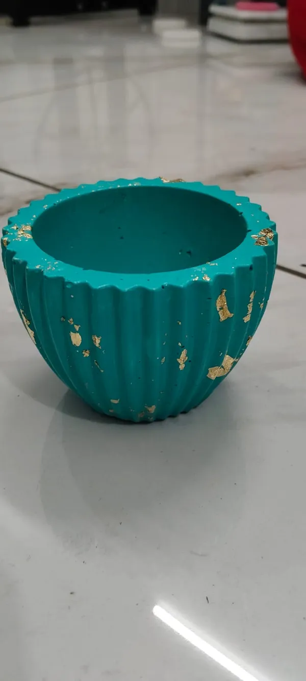 Handcrafted_Turquoise_Bowl_With_Gold_Leaf_Accents