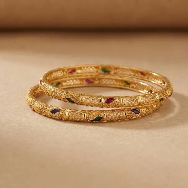 Gold_Tone_Engraved_Bangles_With_Red_And_Black_Stone_Embellishments_Set_Of_2