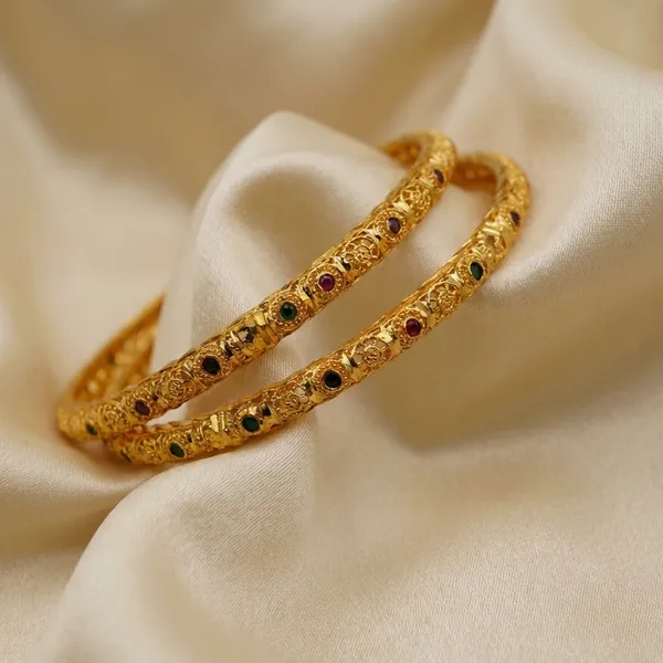 Gold_Plated_Textured_Bangles_With_Black_Stone_Embellishments_Set_Of_2