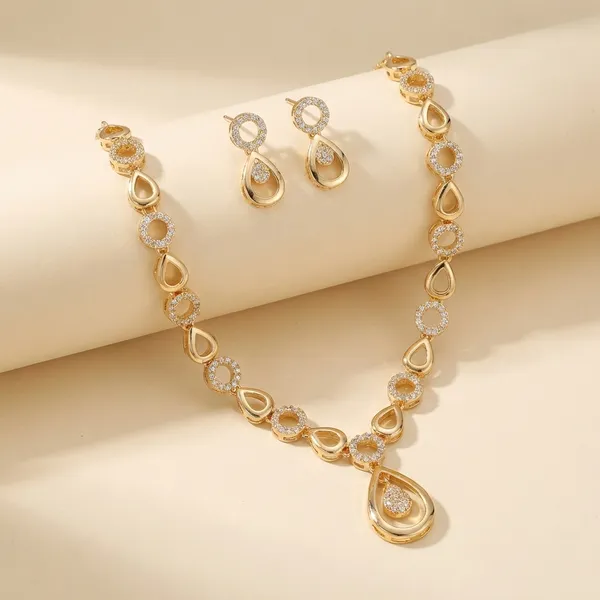 Gold_Tone_Teardrop_And_Circle_Necklace_Set_With_Earrings_Nk_9