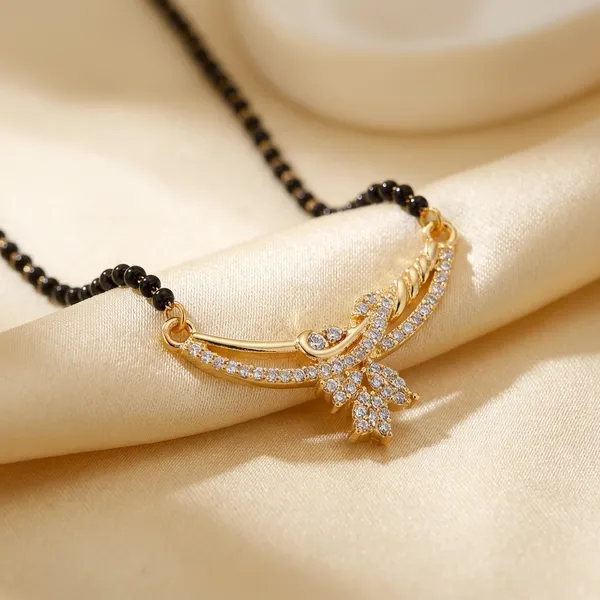 Black_Beaded_Mangalsutra_With_Gold_Tone_Pendant_Traditional_Design