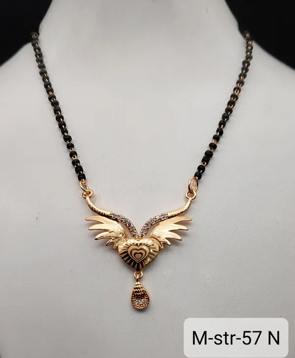 Gold_Tone_Winged_Heart_Pendant_Necklace_With_Teardrop_Charm