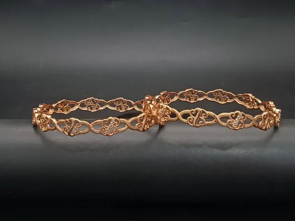 Rose_Gold_Twisted_Bangle_Bracelet_Elegant_Design