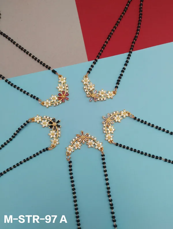Black_Beaded_Mangalsutra_With_Golden_Floral_Pendant