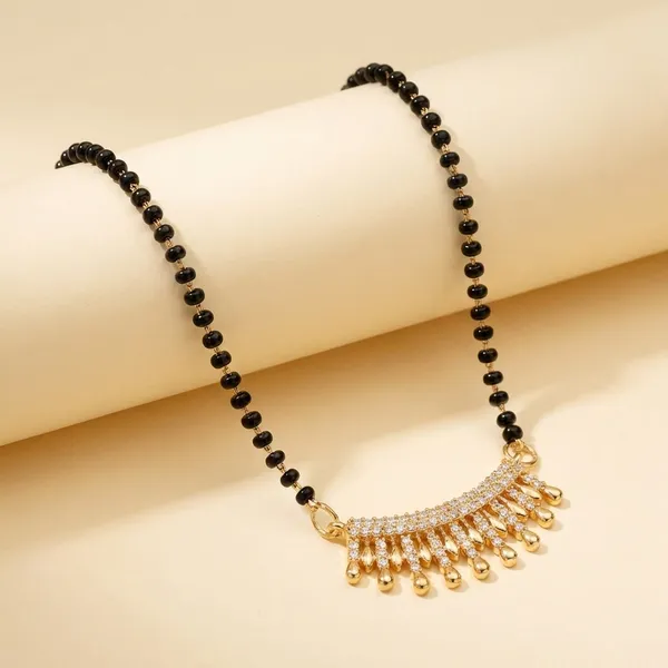 Black_Beaded_Mangalsutra_Necklace_With_Gold_Pendant_Elegant_Design