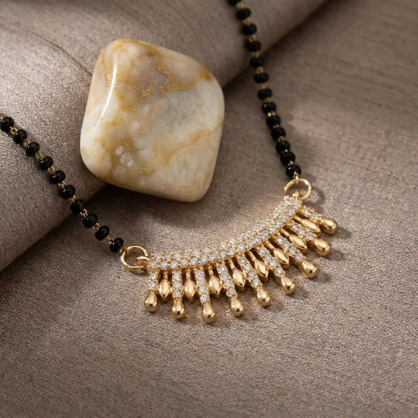 Black_Beaded_Mangalsutra_Necklace_With_Gold_Pendant_Elegant_Design