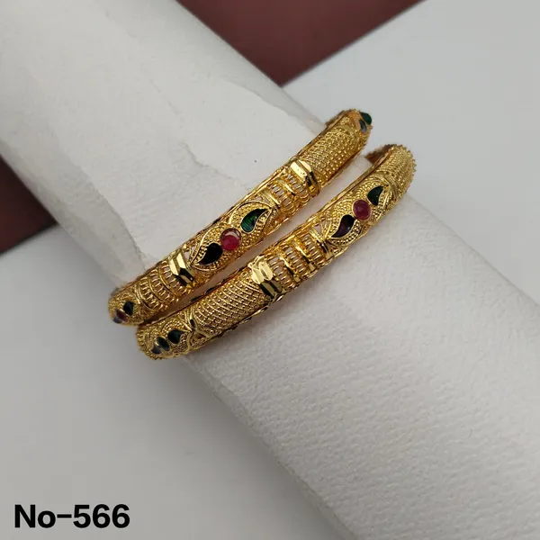 Gold_Tone_Textured_Bangles_With_Ruby_And_Emerald_Accents_Set_Of_2