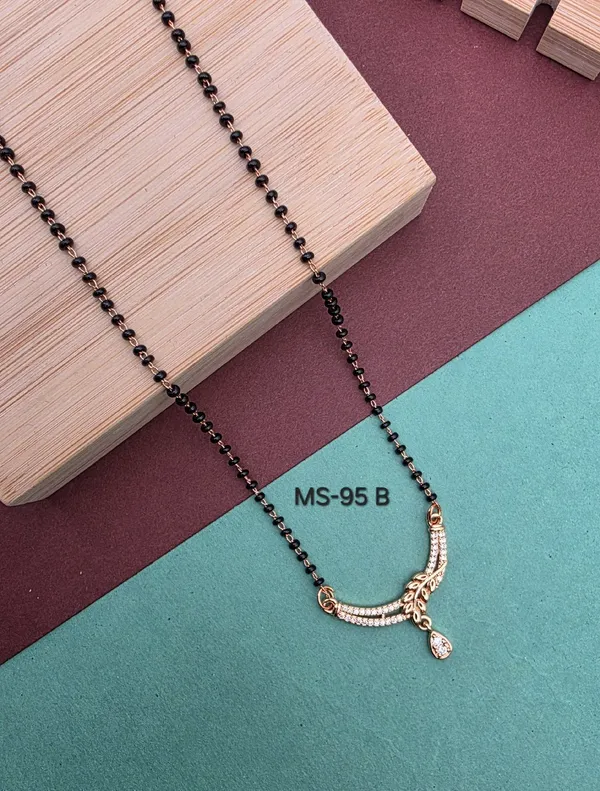 Black_Beaded_Mangalsutra_With_Golden_Pendant_Elegant_Design