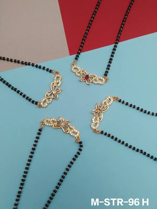 Black_Beaded_Mangalsutra_Set_With_Gold_Tone_Pendants_Set_Of_4