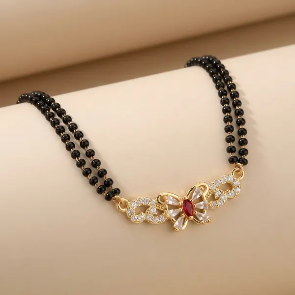 Black_Beaded_Mangalsutra_Set_With_Gold_Tone_Pendants_Set_Of_4