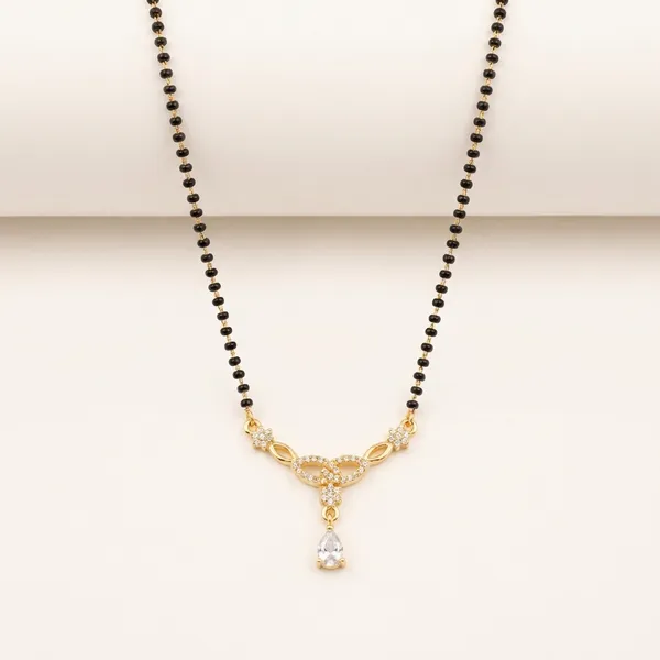 Black_Beaded_Mangalsutra_With_Golden_Pendant_And_Diamond_Accent