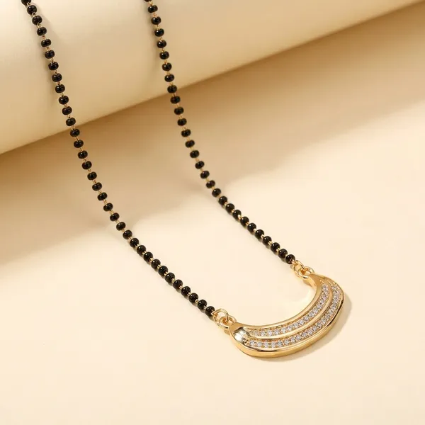 Golden_Mangalsutra_Pendant_Necklace_With_Black_Beads_Elegant_Design