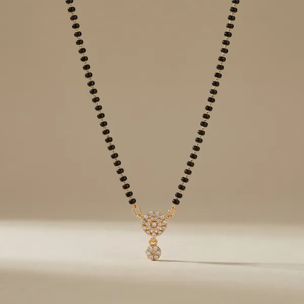 Black_Beaded_Mangalsutra_Necklace_With_Golden_Om_Pendant