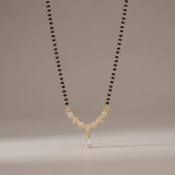 Black_Beaded_Mangalsutra_With_Golden_Pendant