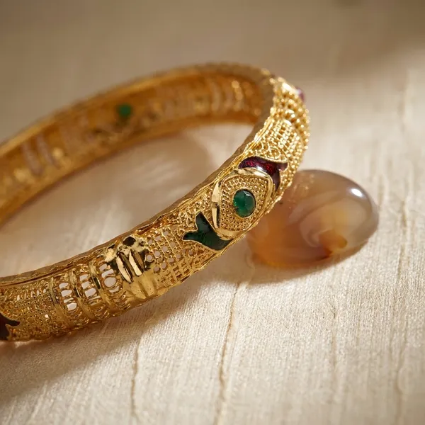 Gold_Tone_Bangles_With_Green_Stone_And_Meenakari_Work_Pair