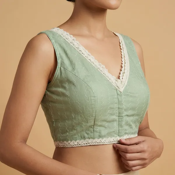 Light_Green_Sleeveless_Saree_Blouse_With_Lace_Border
