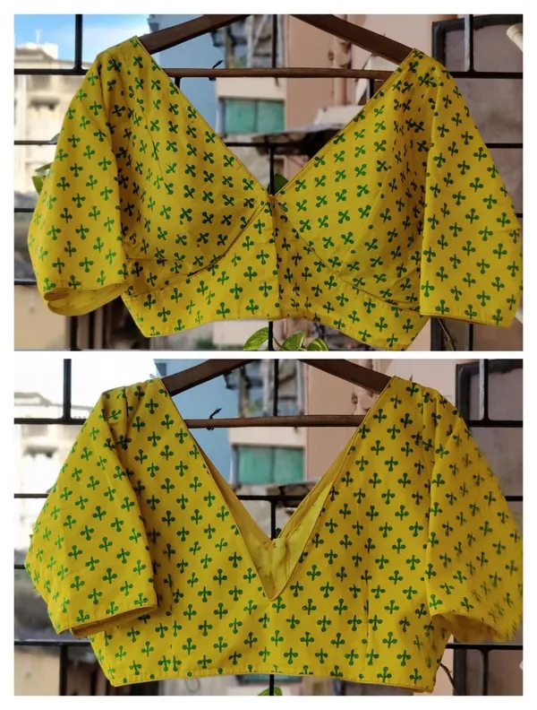 Yellow_Printed_Puffed_Sleeves_And_Deep_V_Neck_Blouse