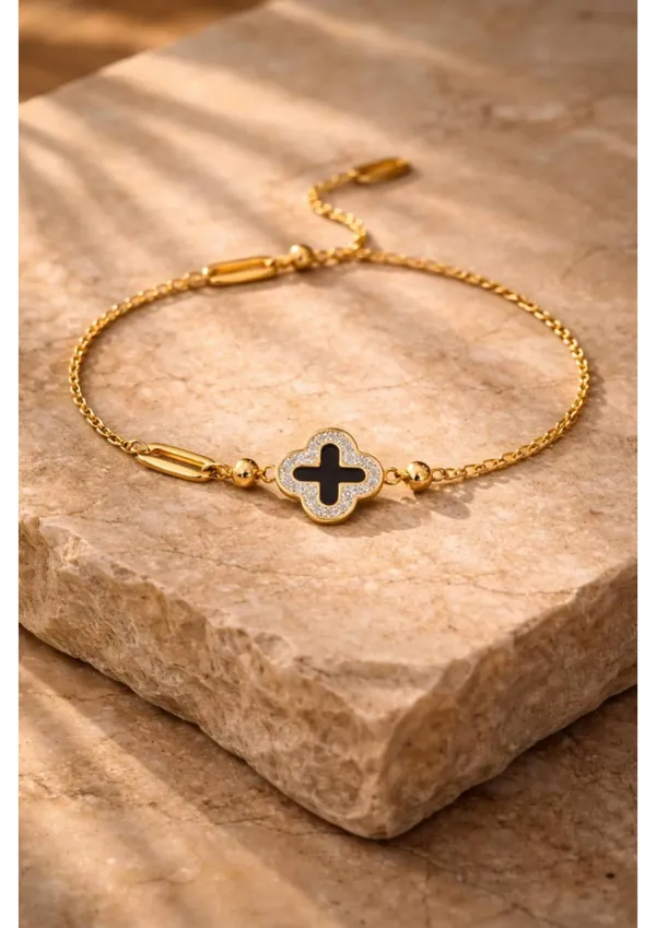 Four-Leaf_Clover_Bracelet_With_Black_Enamel_And_Gold_Chain