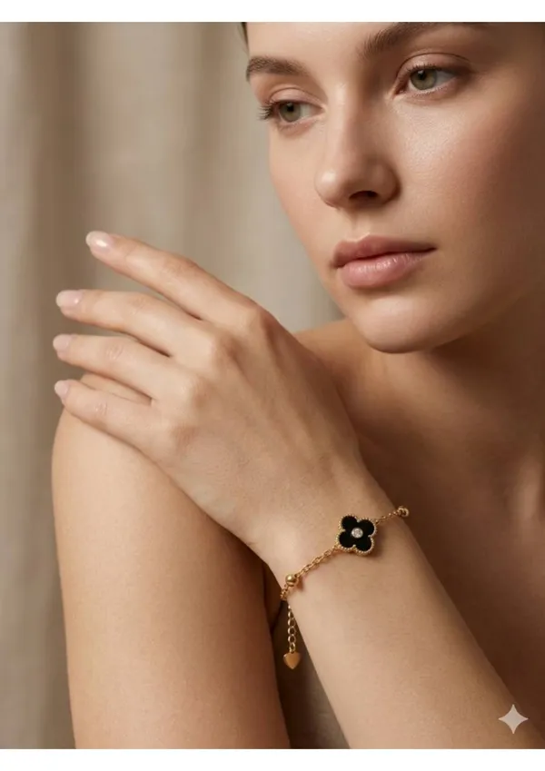 Four-Leaf_Clover_Black_Enamel_Gold-Tone_Chain_Bracelet_With_Heart_Charm
