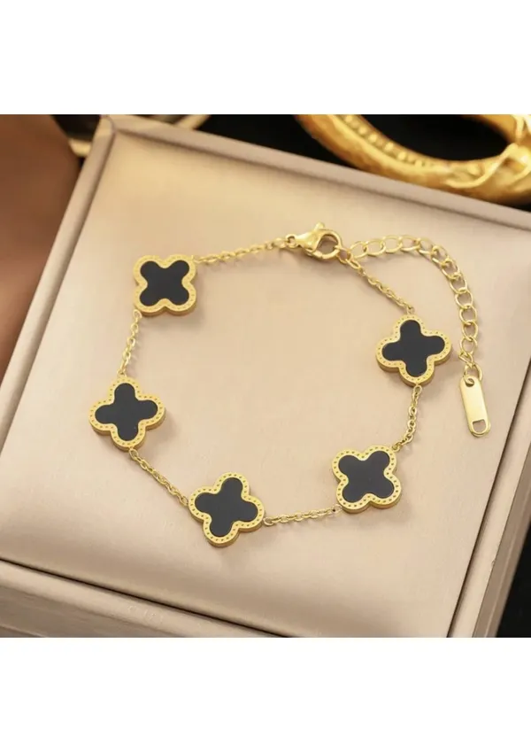 Elegant_Black_Clover_Charm_Bracelet_With_Gold_Trim