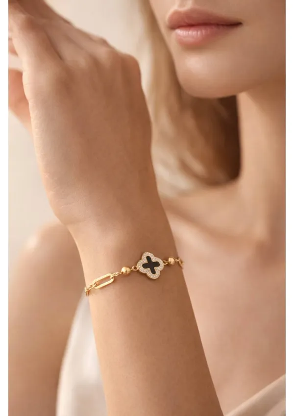 Four-Leaf_Clover_Bracelet_With_Black_Enamel_And_Gold_Chain