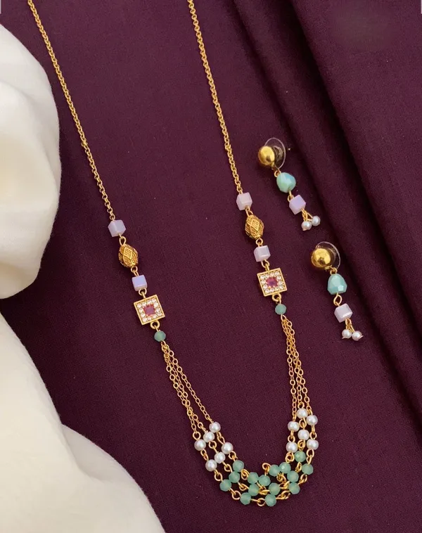 Gold_Alloy,_Stones_Necklace_And_Earring_Set_For_Women