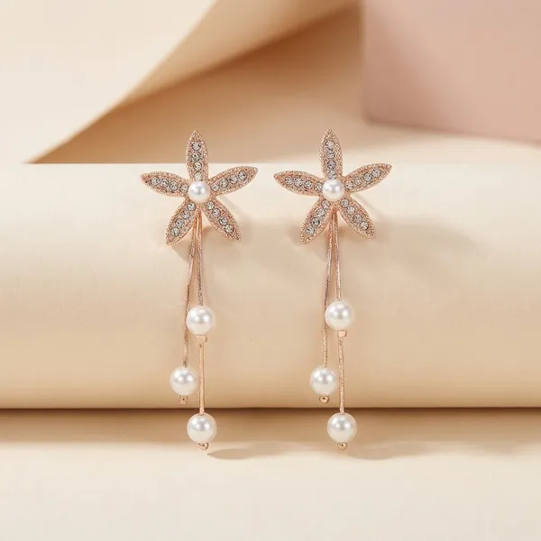 Rose_Gold_Celestial_Saturn_Drop_Earrings_With_Luminous_Cats_Eye_Planet_And_Crystal_Star_Detail