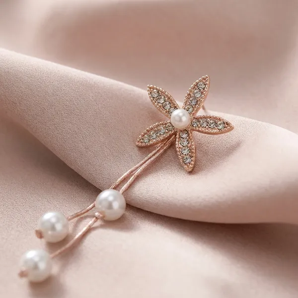 Rose_Gold_Celestial_Saturn_Drop_Earrings_With_Luminous_Cats_Eye_Planet_And_Crystal_Star_Detail