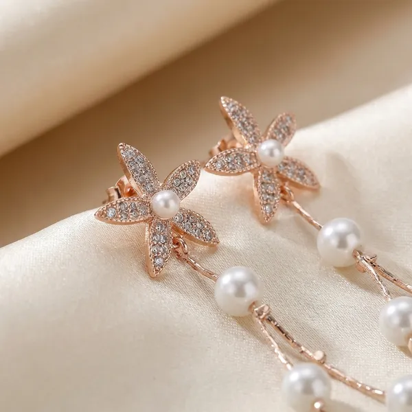 Rose_Gold_Butterfly_Dangle_Earrings_With_Heart_Pearl_Accents_And_Crystal_Studs