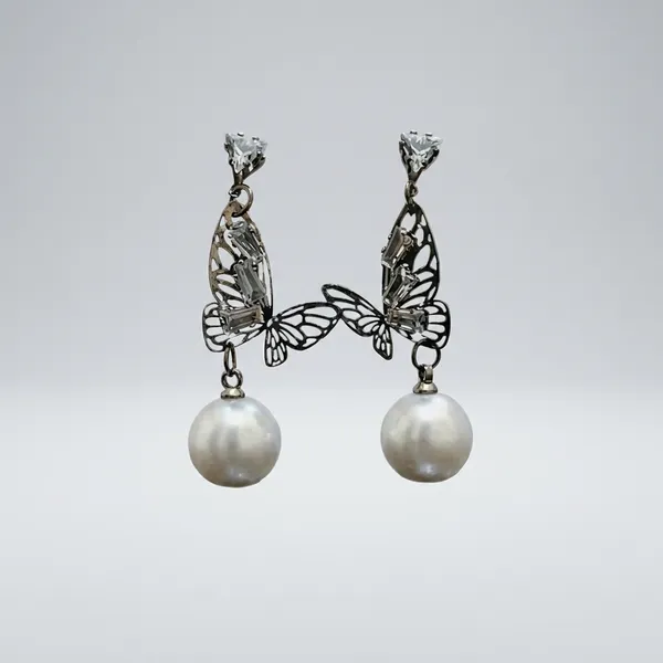 Silver_And_White_Butterfly_Dangle_Earrings_With_Heart_Pearl_Accents_And_Crystal_Studs
