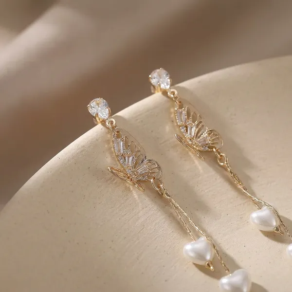 Gold_Butterfly_Dangle_Earrings_With_Heart_Pearl_Accents_And_Crystal_Studs