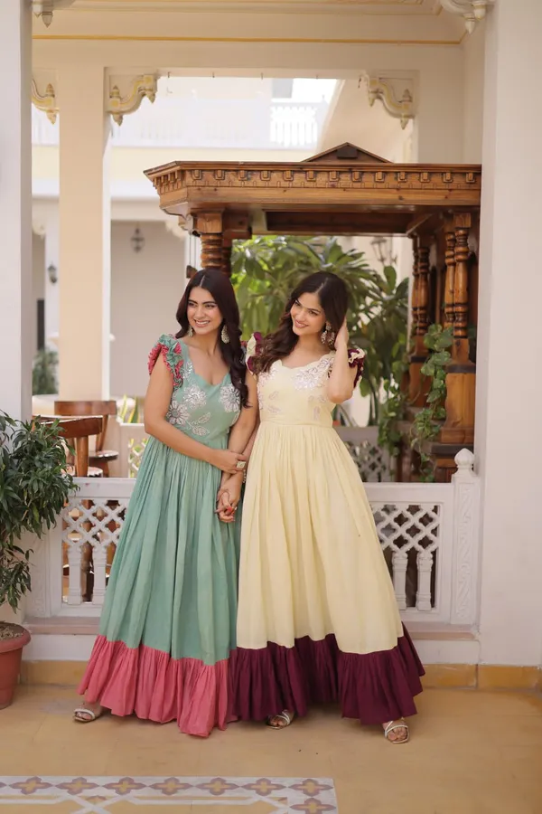 Beige_Elegant_Pastel_Fla_Gown_With_Contrast_Borders_And_Ruffled_Sleeves_For_Women