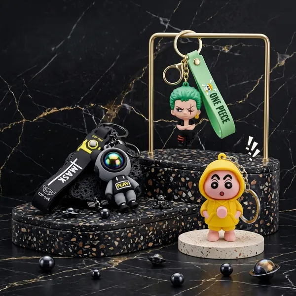 Premium_Anime_Keychain_Triple_Combo_Pack_-_Shinchan,_Astronaut_and_One_Piece_Zoro_Silicone_Keychain_with_Wrist_Strap_Pack_of_3