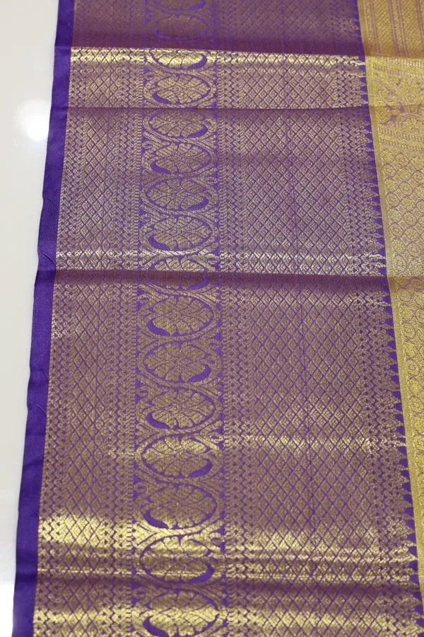 Coral_Red_Kanchipuram_Inspired_Semi_Silk_Saree_With_Wide_Contrast_Border