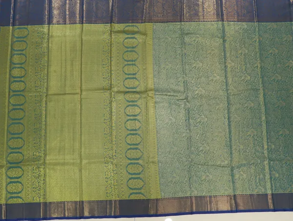 Parrot_Green_Kanchipuram_Inspired_Semi_Silk_Saree_With_Wide_Contrast_Border