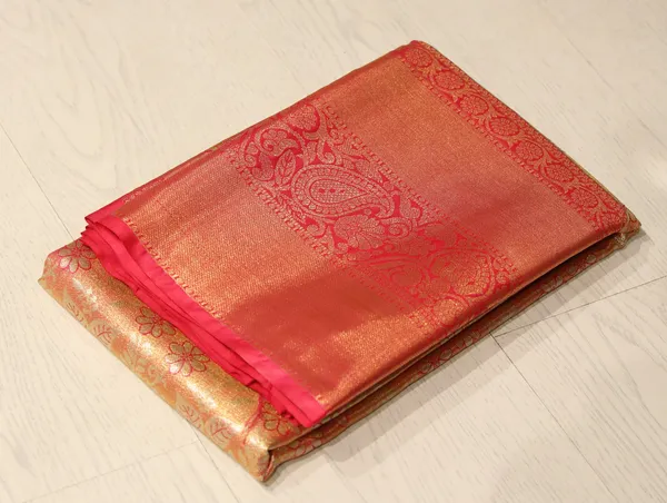 Peach_Orange_Uppada_Inspired_Semi_Silk_Saree_With_Contrast_Border