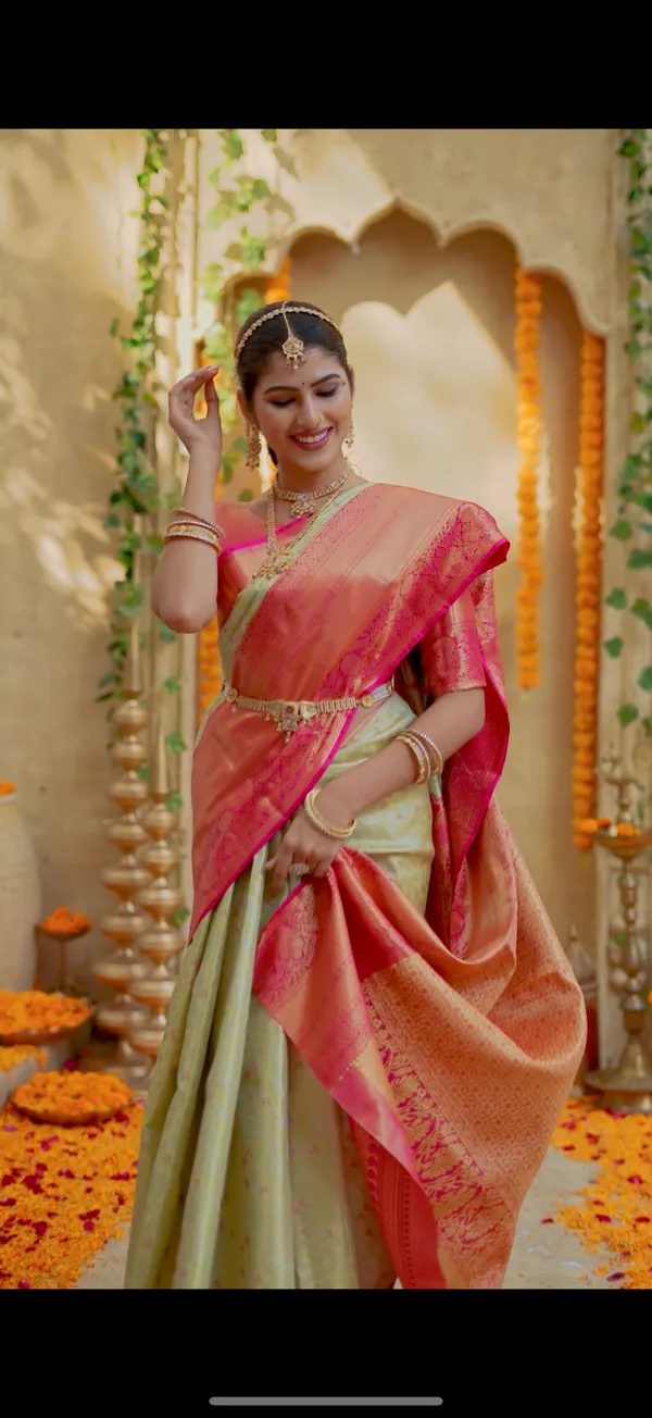 Pistachio_Pastel_Green_&_Coral_Pink_Kanchipuram_Inspired_Semi_Silk_Saree_With_Geometric_Zari_Border