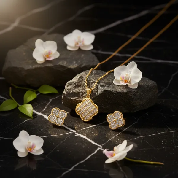 Golden_Elegant_Gold_Plated_Floral_Quatrefoil_Pendant_Necklace_And_Earrings_Set_With_Cubic_Zirconia_Stones_For_Women