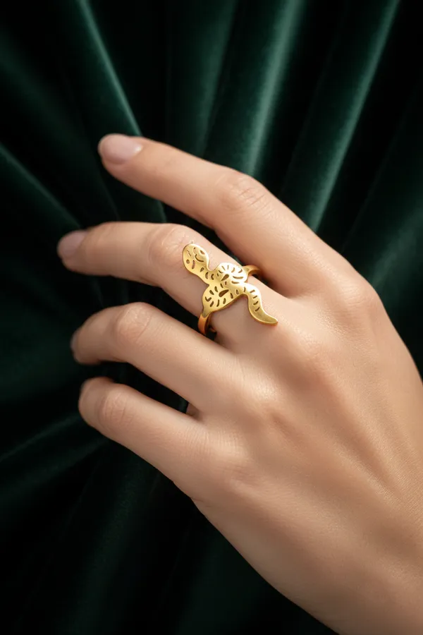 Golden_Elegant_Snake_Ring_With_Intricate_Cutout_Design_For_Women