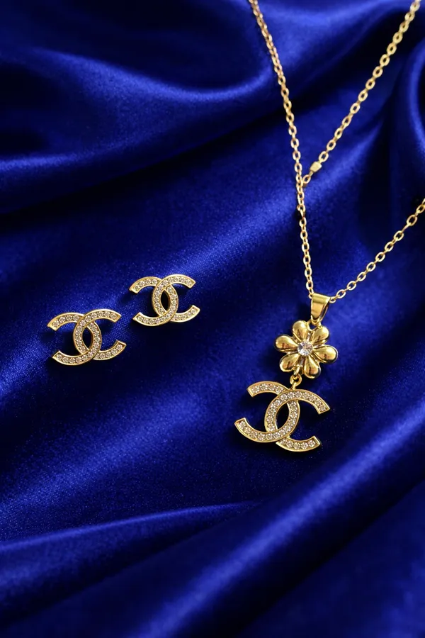 Golden_Floral_Cc_Pendant_Necklace_And_Earring_Set_With_Crystal_Embellishments_For_Women