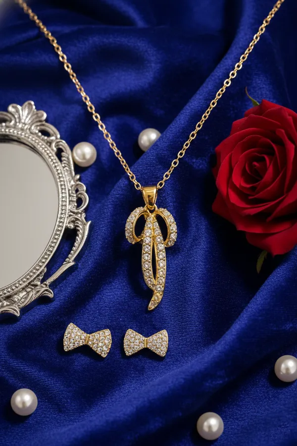 Gold_Plated_Crystal_Studded_Pendant_Necklace_With_Bow_Earrings_Jewellery_Set_For_Women