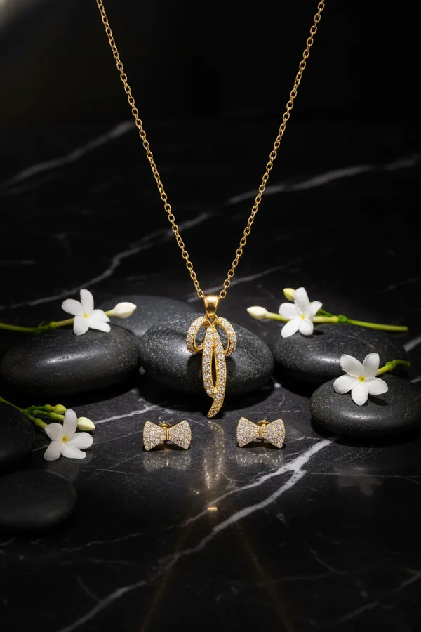Gold_Plated_Crystal_Studded_Pendant_Necklace_With_Bow_Earrings_Jewellery_Set_For_Women