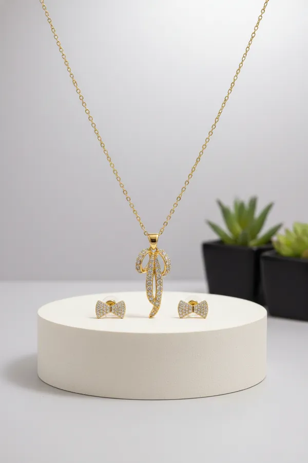 Gold_Plated_Crystal_Studded_Pendant_Necklace_With_Bow_Earrings_Jewellery_Set_For_Women