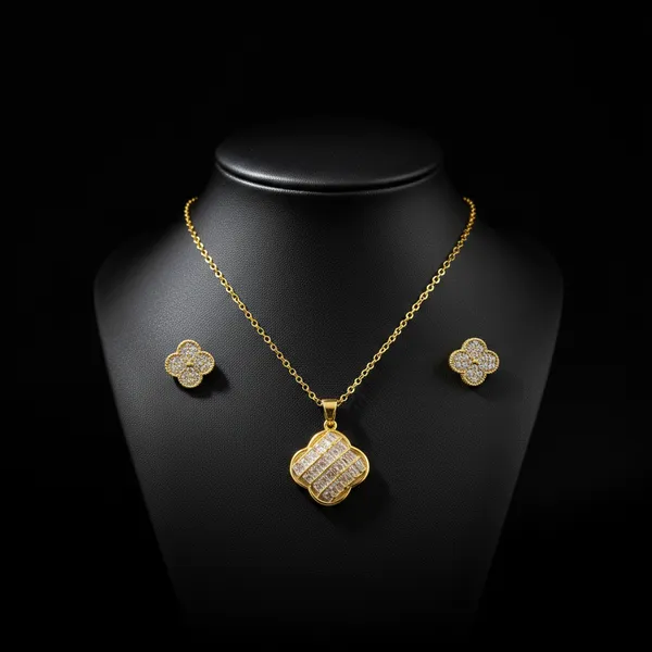 Golden_Elegant_Gold_Plated_Floral_Quatrefoil_Pendant_Necklace_And_Earrings_Set_With_Cubic_Zirconia_Stones_For_Women