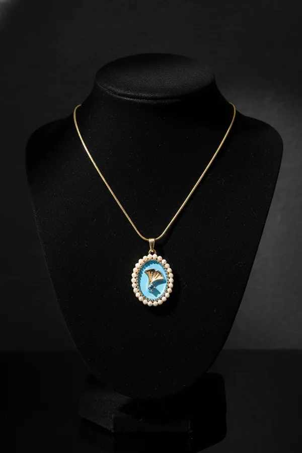 Silver_Blue_Oval_Shell_Pendant_Necklace_With_Pearl_Border_And_Gold_Chain_For_Women
