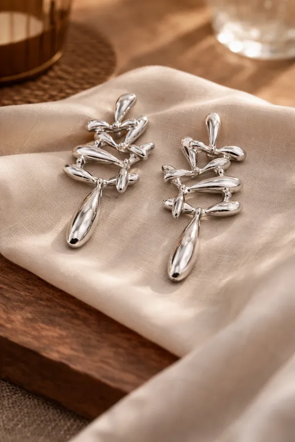 Silver_Elegant_Toned_Drop_Earrings_With_Abstract_Design_For_Women