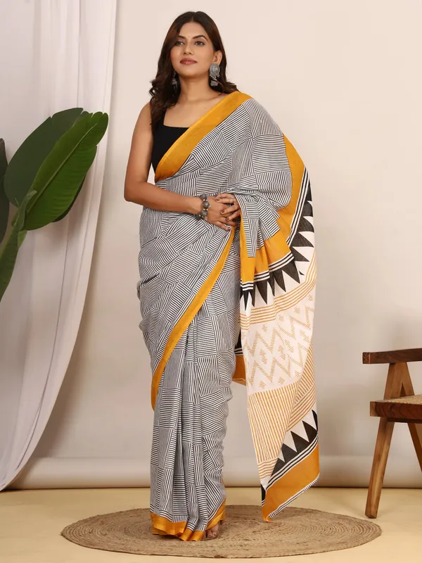 Black_&_White_Geometric_Printed_Cotton_Saree_with_Mustard_Border_|_Elegant_Designer_Soft_Cotton_Saree_for_Women