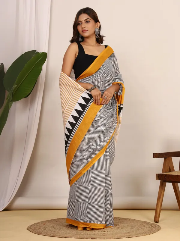 Black_&_White_Geometric_Printed_Cotton_Saree_with_Mustard_Border_|_Elegant_Designer_Soft_Cotton_Saree_for_Women