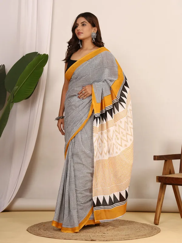 Black_&_White_Geometric_Printed_Cotton_Saree_with_Mustard_Border_|_Elegant_Designer_Soft_Cotton_Saree_for_Women