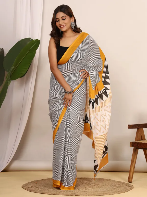 Black_&_White_Geometric_Printed_Cotton_Saree_with_Mustard_Border_|_Elegant_Designer_Soft_Cotton_Saree_for_Women